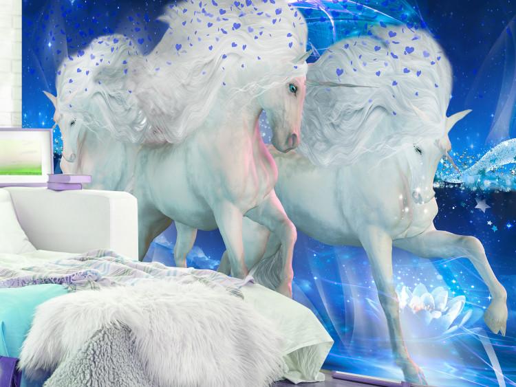 Wall Mural White unicorns - magical motif in blue shades with sparkle