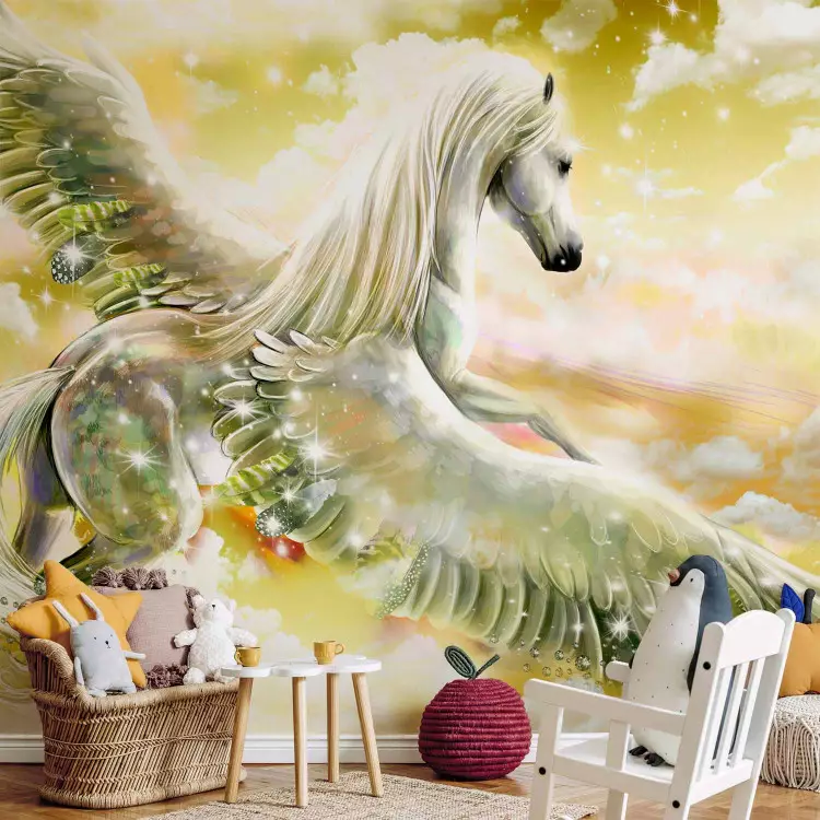 Wall Mural Pegasus - magical motif of a flying horse in clouds in yellow designs