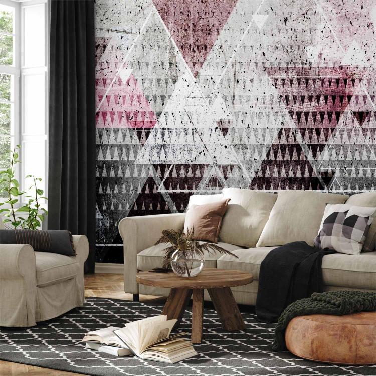 Wall Mural Triangles - geometric composition in various colours on a concrete background