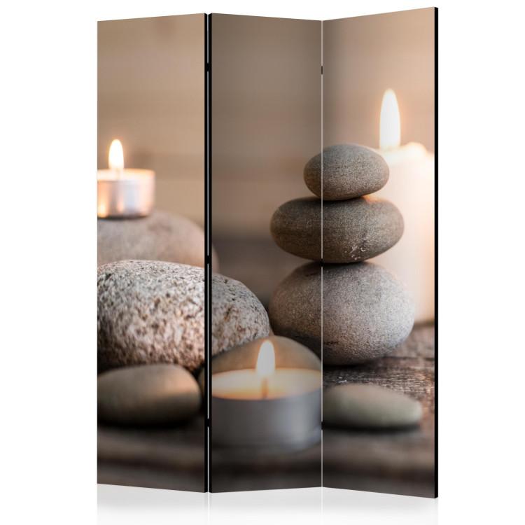 Room Divider Relaxation - candle amidst a tower of stones in an oriental motif