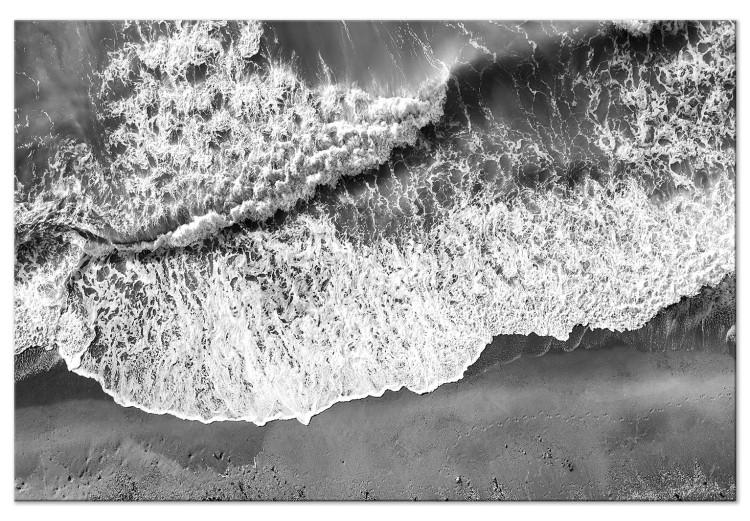 Canvas Print Ocean shore - black and white photograph of waves hitting the beach