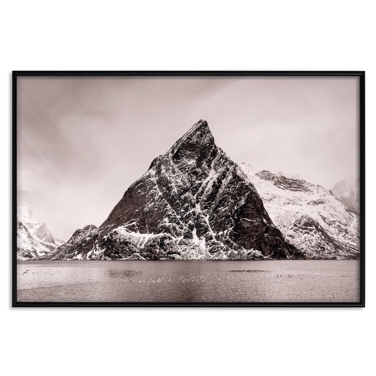 Poster Lofoten - landscape of a high mountain on a solitary island in the middle of winter