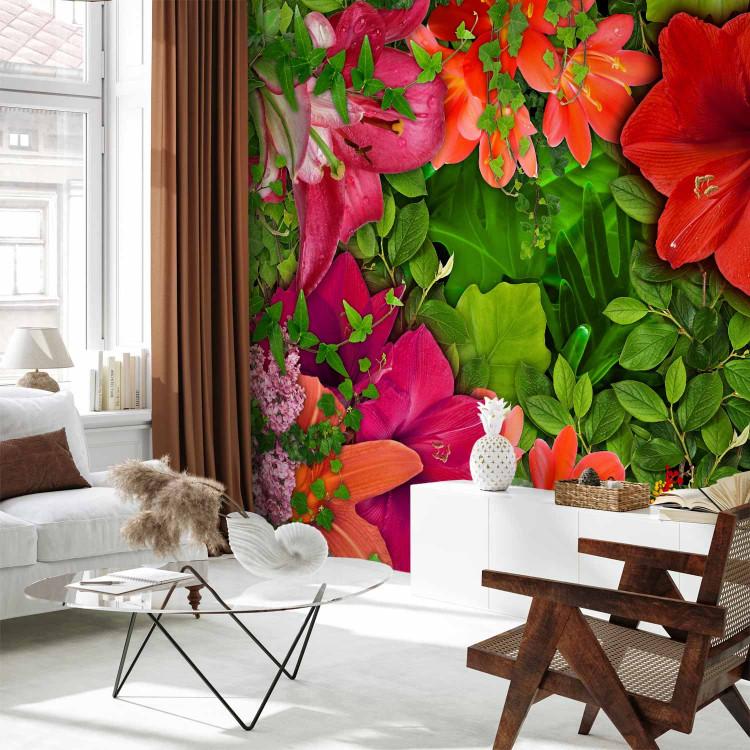 Wall Mural Red lilies - flowers of intense colors against the backdrop of foliage