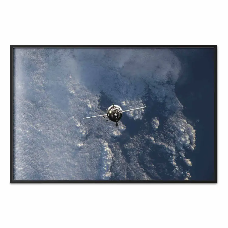 Blue Planet - space satellite above Earth against the backdrop of sky and clouds