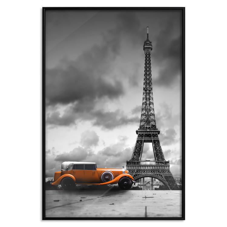 Poster Orange Car - photograph of vehicle against Eiffel Tower and sky