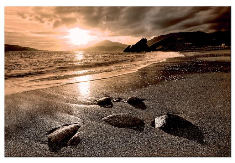 Canvas Print Sunset over the sea in sepia - a moody sea landscape