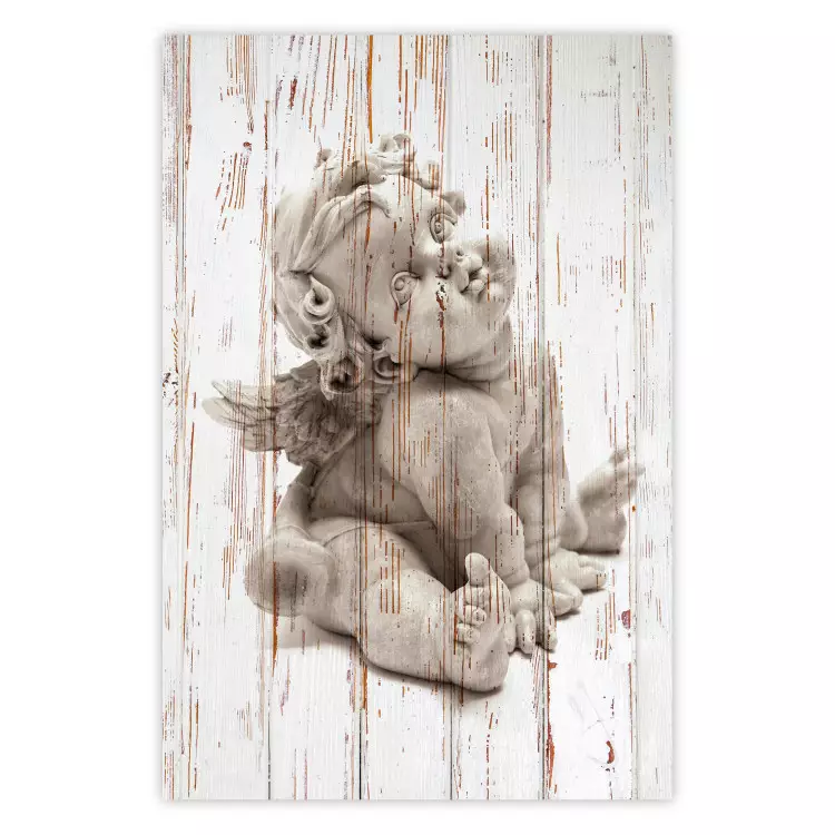 Contemplative Love - stone sculpture of an angel on a wooden texture background