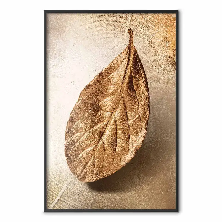 Golden Lightness - golden leaf with distinct texture on a beige background