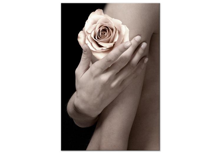 Canvas Print Tea rose on a hand - photo of a woman holding a flower in her hand