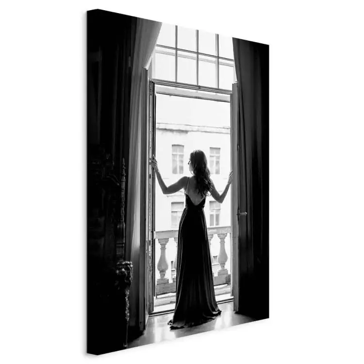 Woman in window - black and white photograph with woman silhouette