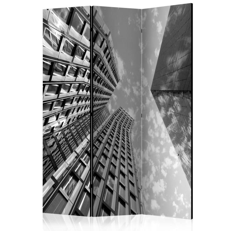 Room Divider Touch the Sky - black and white tall skyscrapers against the sky and clouds