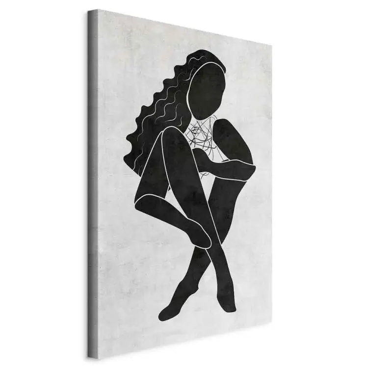 Seated woman figure - black woman silhouette on grey background