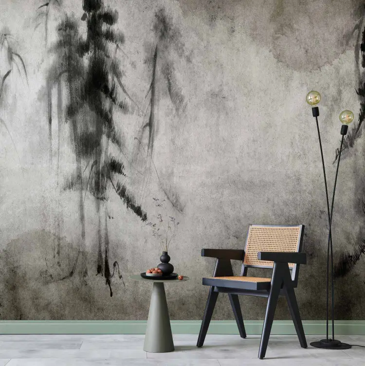 Abstraction - motif of painted black trees on a stained sheet of paper