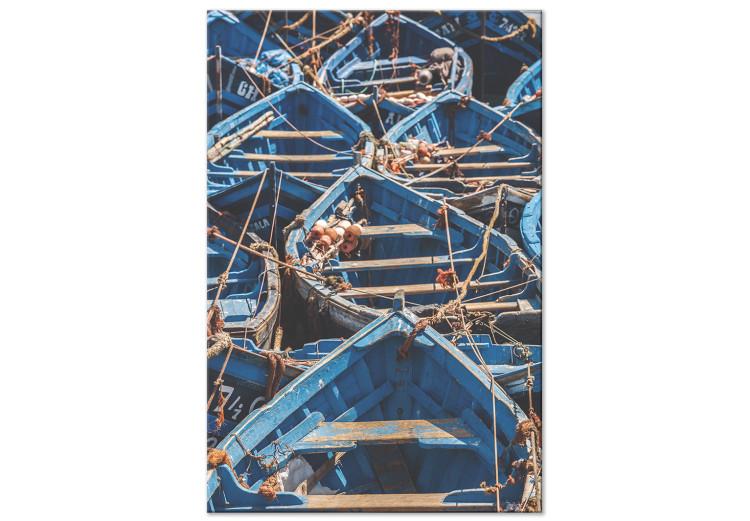 Canvas Print Blue Fleet (1-piece) Vertical - maritime landscape of boats in Morocco