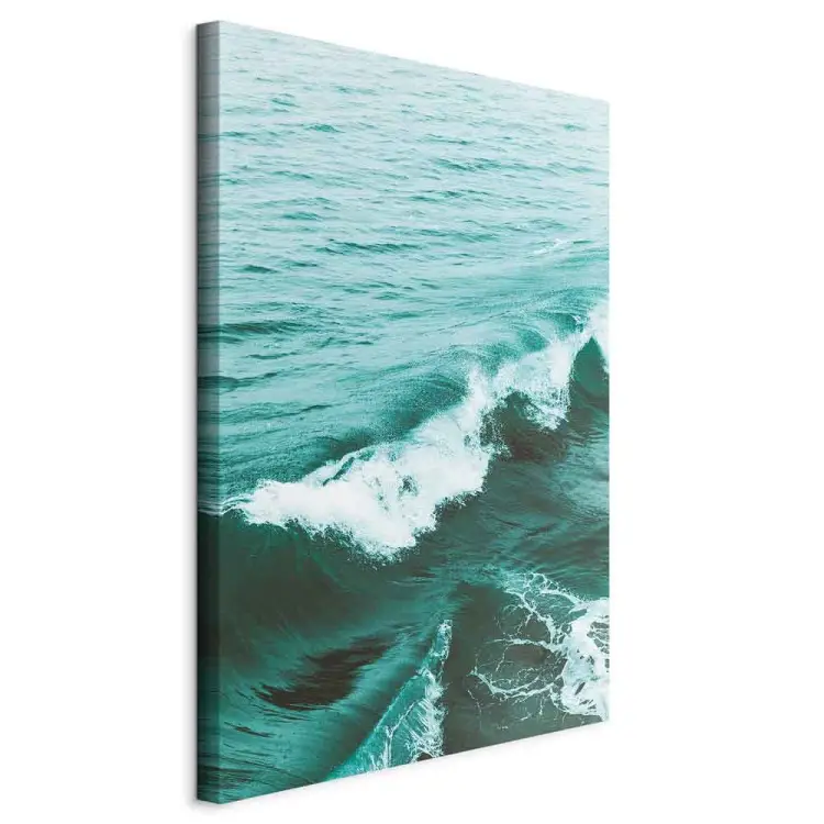 A peaceful wave - deep green sea with a small wave in the foreground