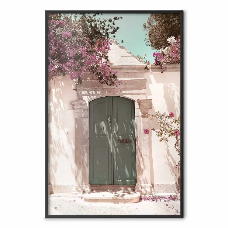 Charming Alley - architecture of a wall with a green entrance in the sunlight