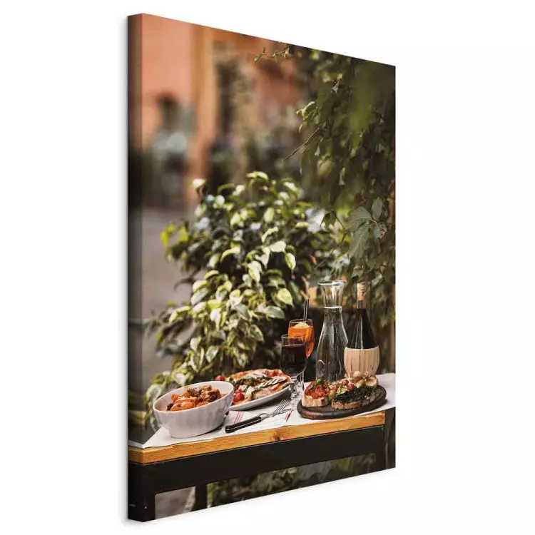 Italian meal - still life photo with plants in the background