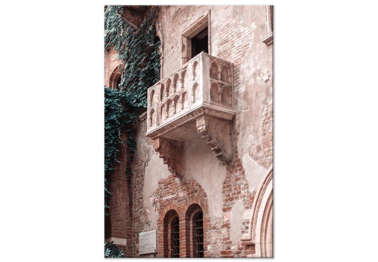 Canvas Print Balcony of a brick tenement - photo with an Italian city architecture