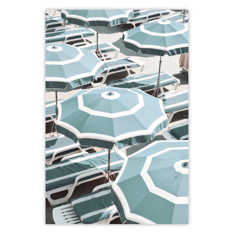 Poster Turquoise Umbrellas - summer landscape of a sandy beach filled with sunbeds