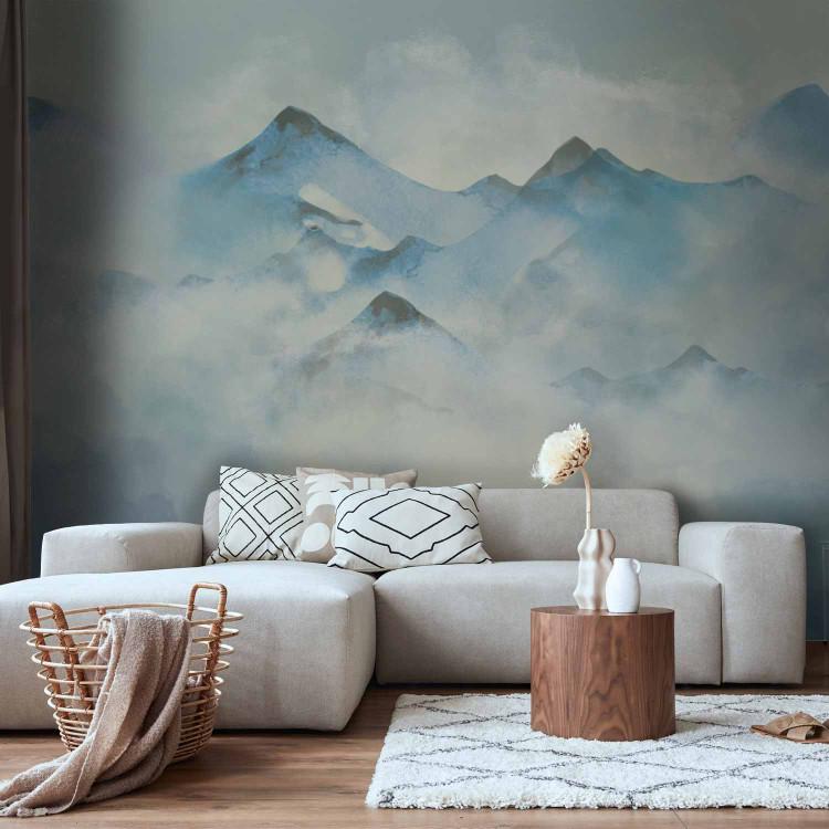 Wall Mural Winter in the mountains - landscape of peaks covered with snow and fog