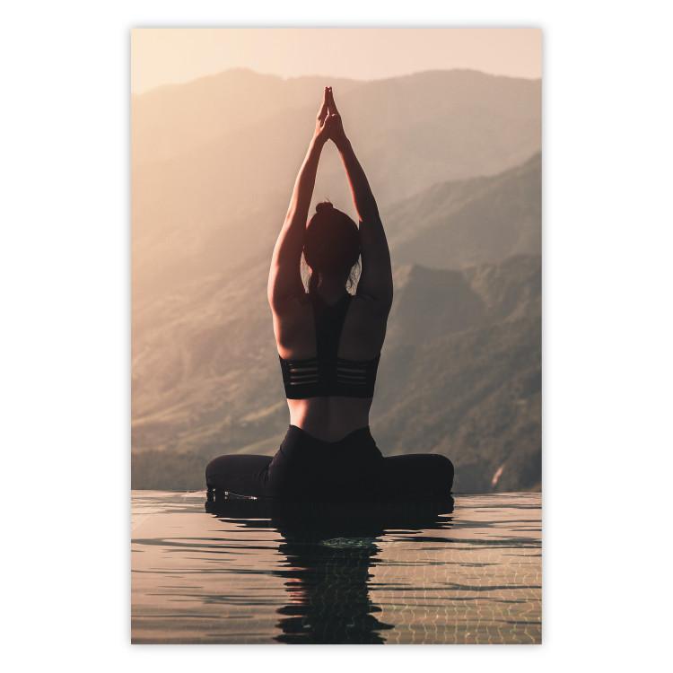 Poster Relaxation in the Mountains - photograph of a woman practicing yoga against a mountain backdrop