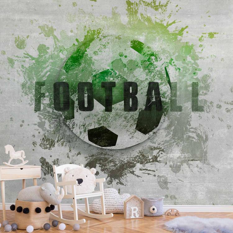 Wall Mural Hobby is football - green motif with a ball and writing in English