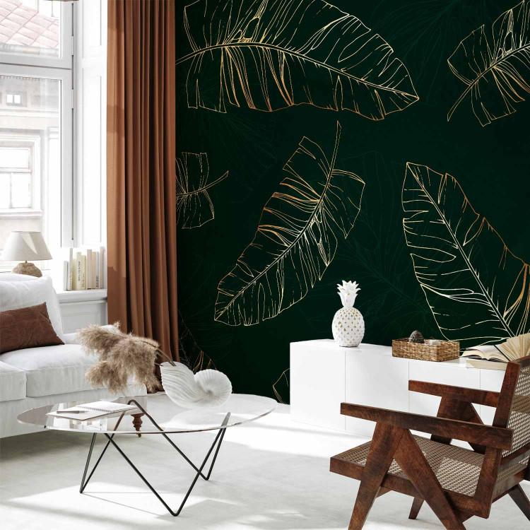 Wall Mural Nature's twitches - outline of exotic leaves in gold on green background