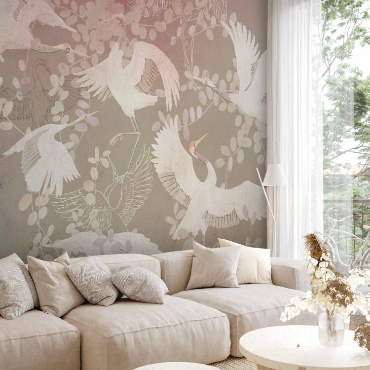 Wall Mural Dancing animals - birds motif among leaves on a dark background with pink