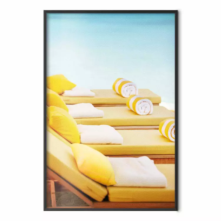 Summer at the Seaside - Yellow Sun Loungers on the Beach Lit by the Holiday Sun