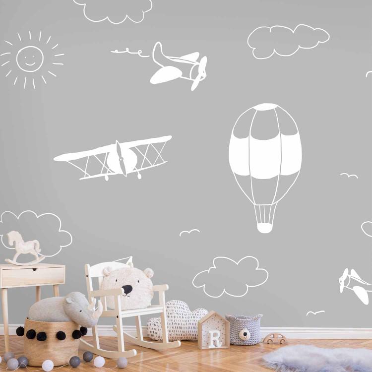 Wall Mural Sky Flight - Drawn Planes Against the Background of a Gray Sky With Clouds