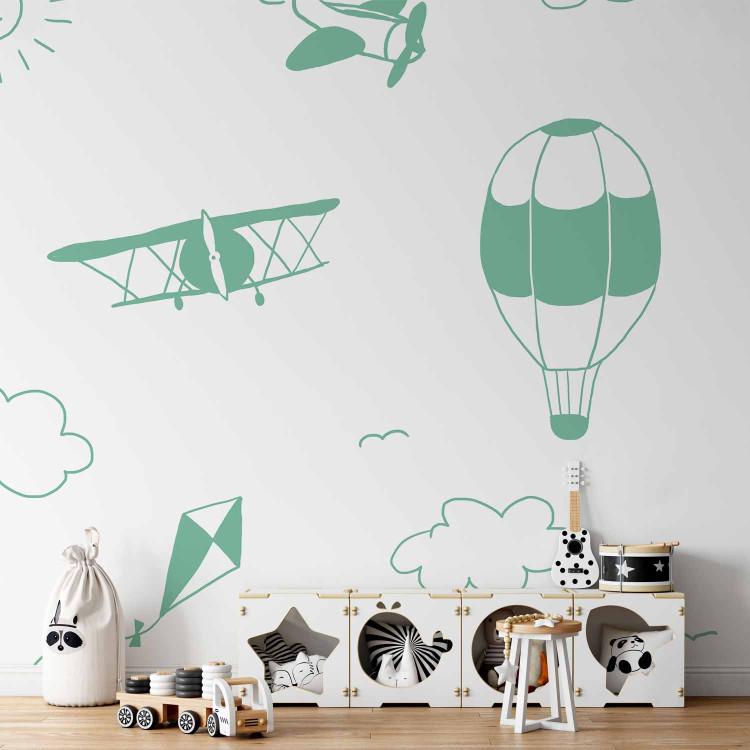 Wall Mural Sky Flight - Drawn Planes on a Background of a Green Sky With Clouds