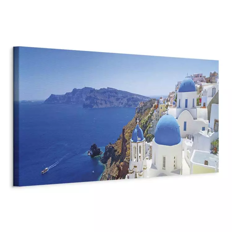 Santorini View - blue domes and white buildings over the Aegean Sea