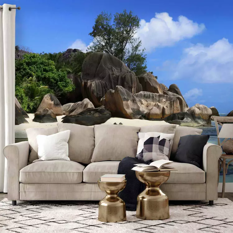 Wall Mural Seychelles - Landscape with a Rocky Island Surrounded by Beach and Tranquil Water