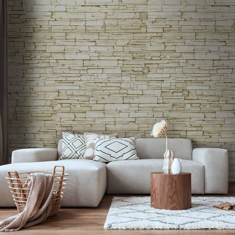 Wall Mural Brick Background - Background with a pattern of arranged white stones resembling a wall