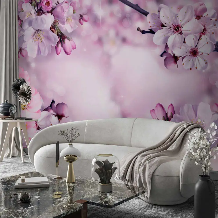 Spring - purple composition of cherry blossoms on a background with flash effect