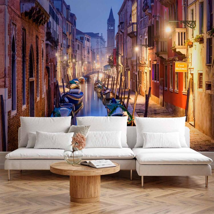 Wall Mural Evening in Venice - landscape of Italian city architecture with boats