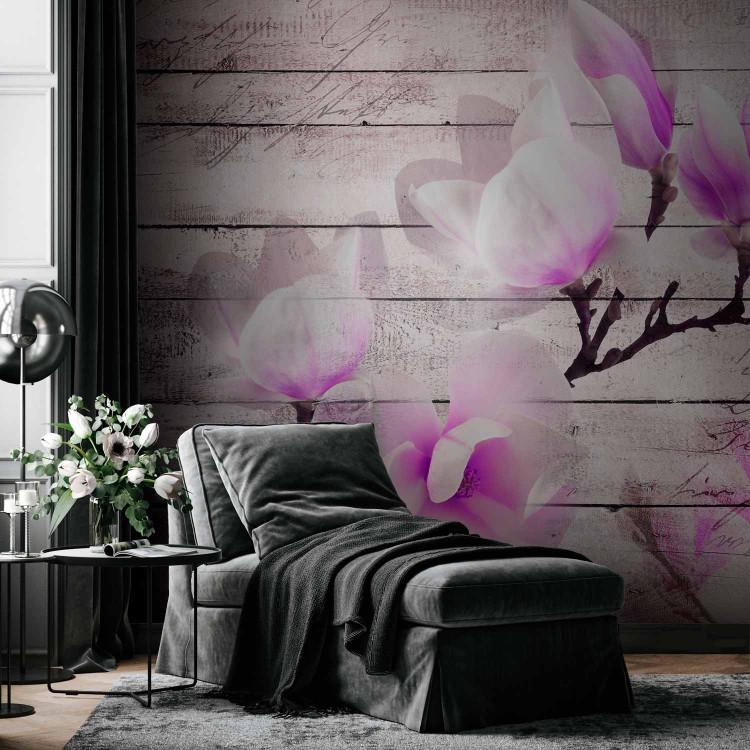 Wall Mural Delicacy of magnolias - purple and white flower on a background of glitter boards