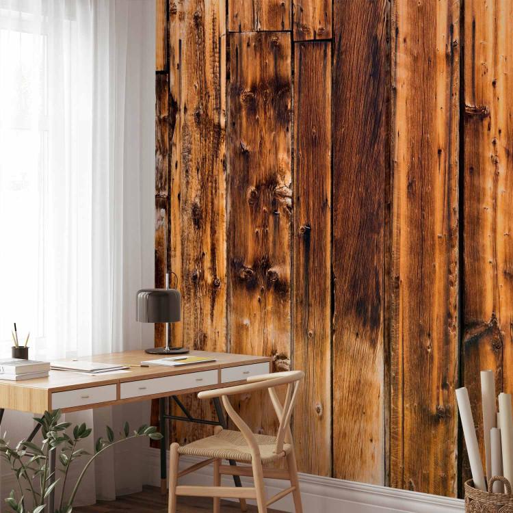 Wall Mural Rustic warmth - patterned composition of brown wooden planks