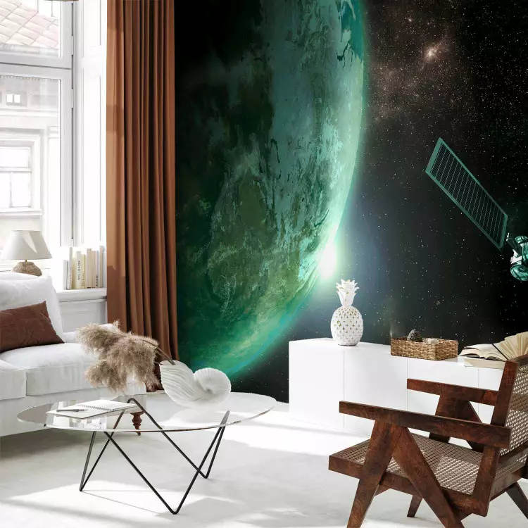 Wall Mural Universe - cosmic landscape with stars, green Earth, and a satellite