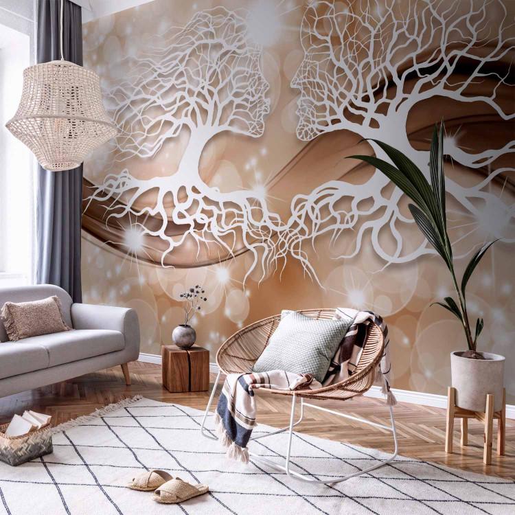 Wall Mural Tree kiss - tree branches in the form of a kiss on light background