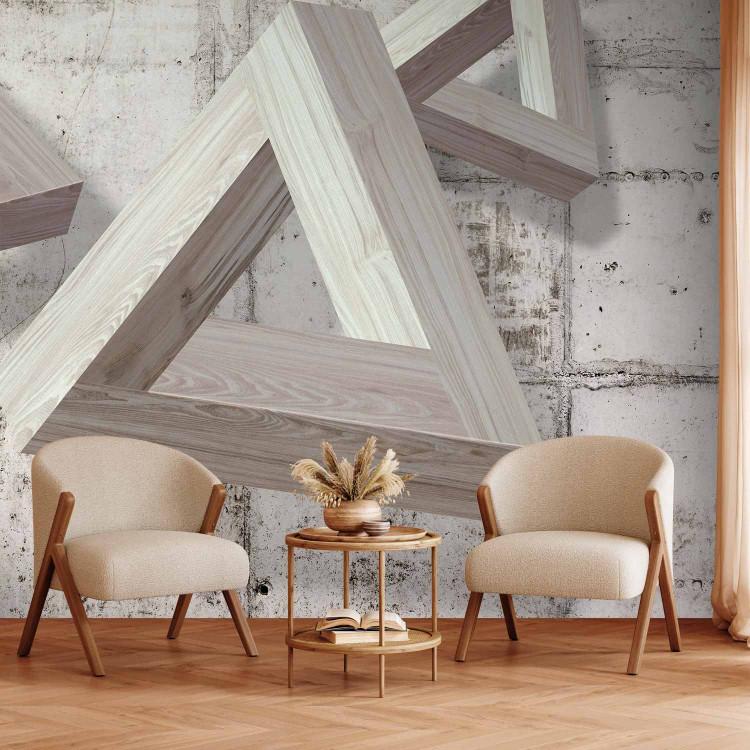 Wall Mural Contemporary composition - three wooden triangles on a concrete background