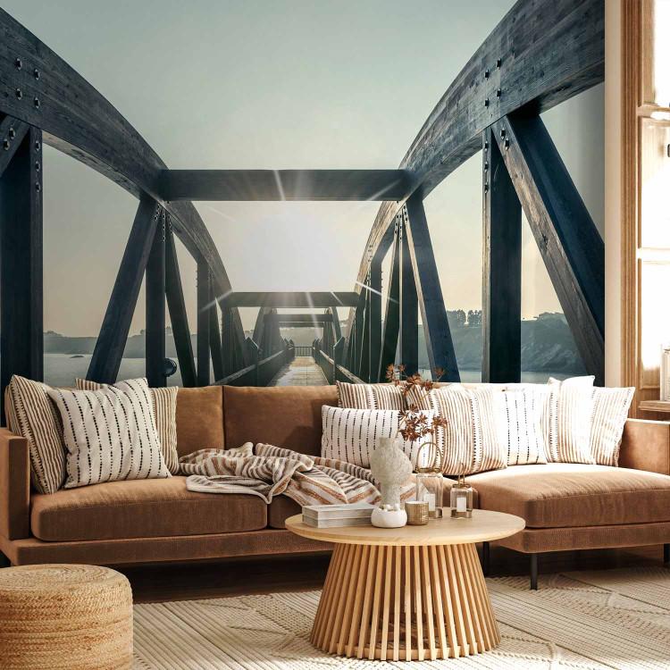 Wall Mural City architecture - wooden bridge in sunlight over a river