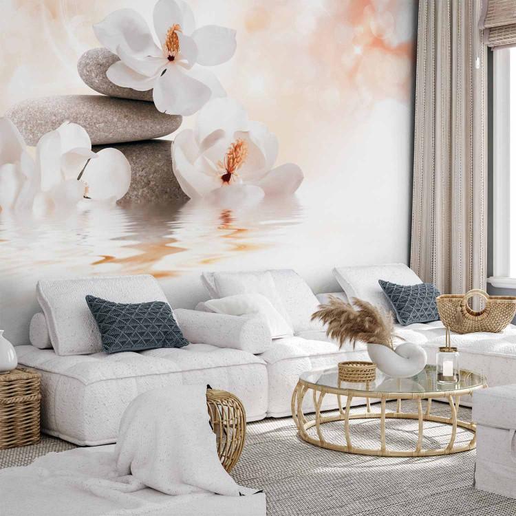 Wall Mural Orient - magnolia flower motif with zen stones on a delicate background