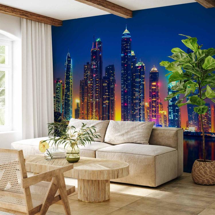 Wall Mural Blue nights Dubai - skyline with skyscrapers and reflection in water