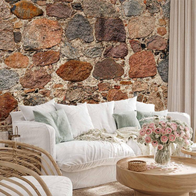 Wall Mural Artistry - texture of irregularly arranged stones in brown colouring