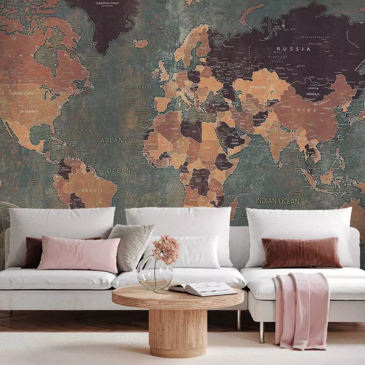 Wall Mural World in green - map of the continents on a non-uniform background with a compass