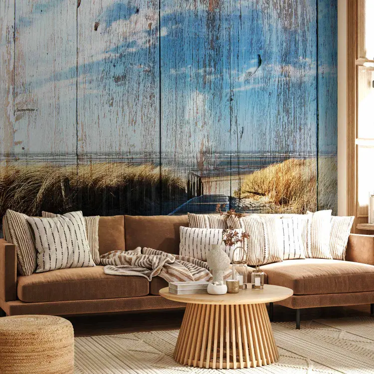 Summer landscape - sandy beach and sea on wooden background