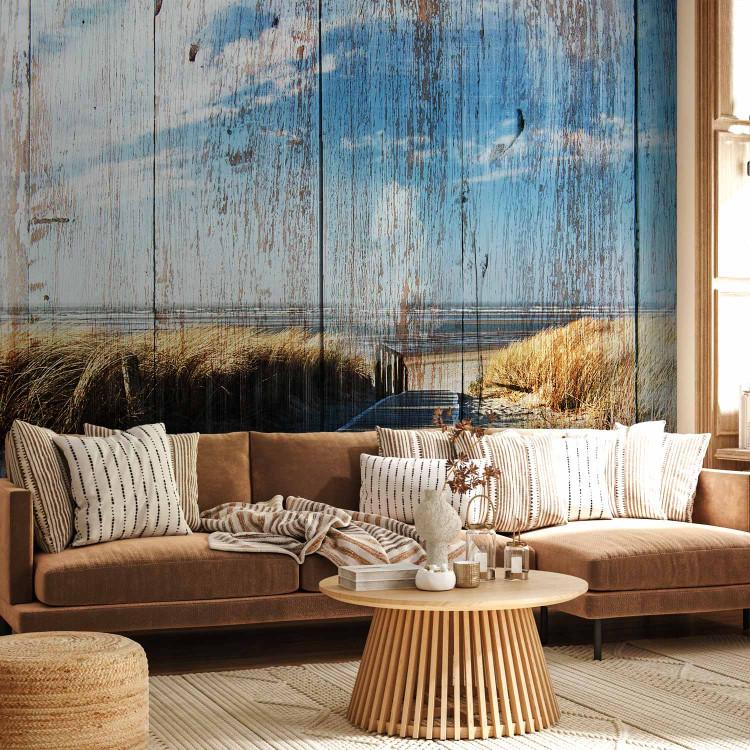 Wall Mural Summer landscape - sandy beach and sea on wooden background