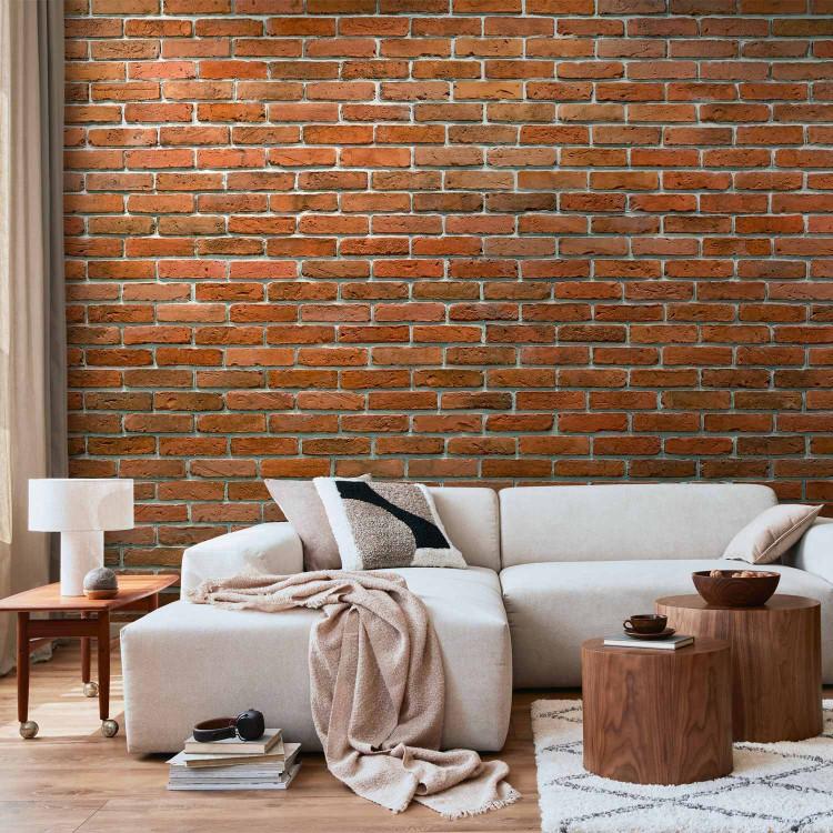 Wall Mural Urban style - orange background with texture of regularly laid bricks