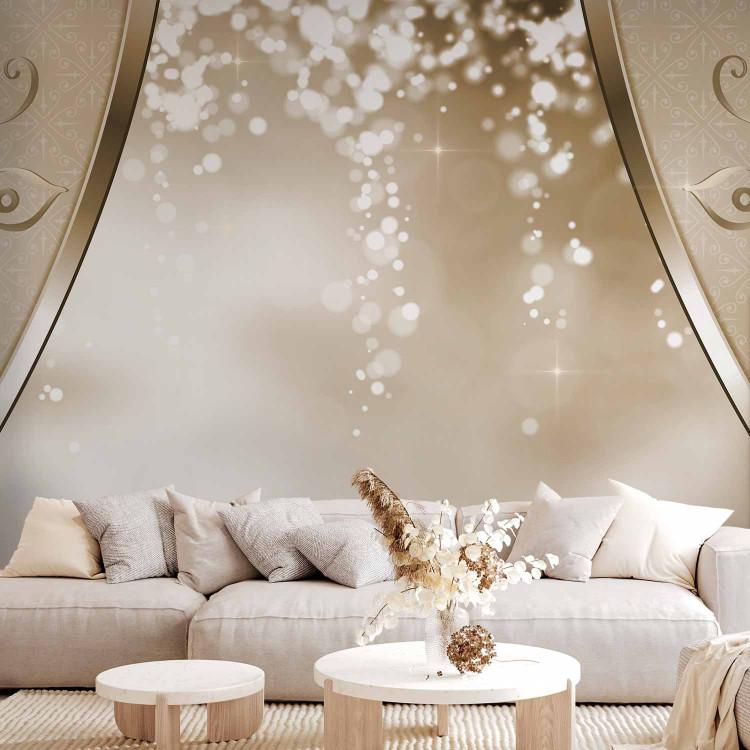Wall Mural Golden abstraction - delicate ornaments on a background with a glowing light effect